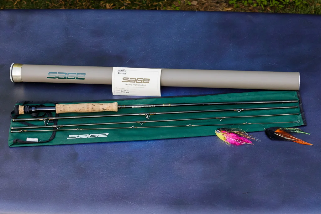 Sage XP 8100-4 fly fishing rod 10 foot 8 weight with original aluminum case.