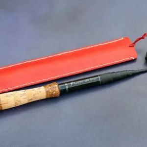 Close up of the artisan signature on a Fly Fishing Artisan Tenkara Graphite 268 rod showing 13 sections and red leather sock.