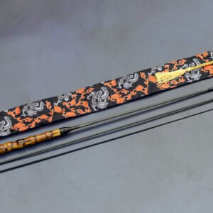 Close-up of the Tenkara Graphite 160 fly fishing rod by Mario Díaz, showing the 29cm closed length and artisan signature.