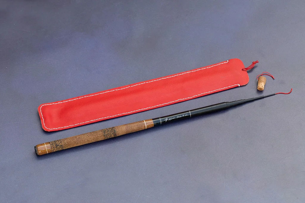 The Fly Fishing Artisan custom-built 3.10m graphite Tenkara rod with red leather-style case